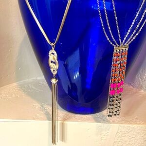 2 long length necklaces to be worn over clothes. Adds pizzazz to any outfit.